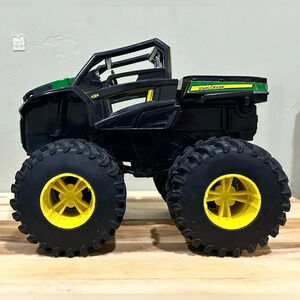 John Deere Ertl Monster Tire 4X4 Gator RSX With Sounds. Great condition.